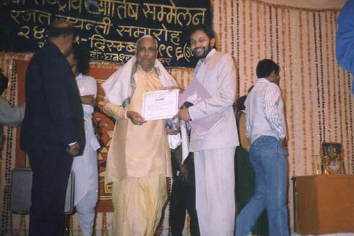 Receiving an Honour from Pt. K A Dubey Padmesh